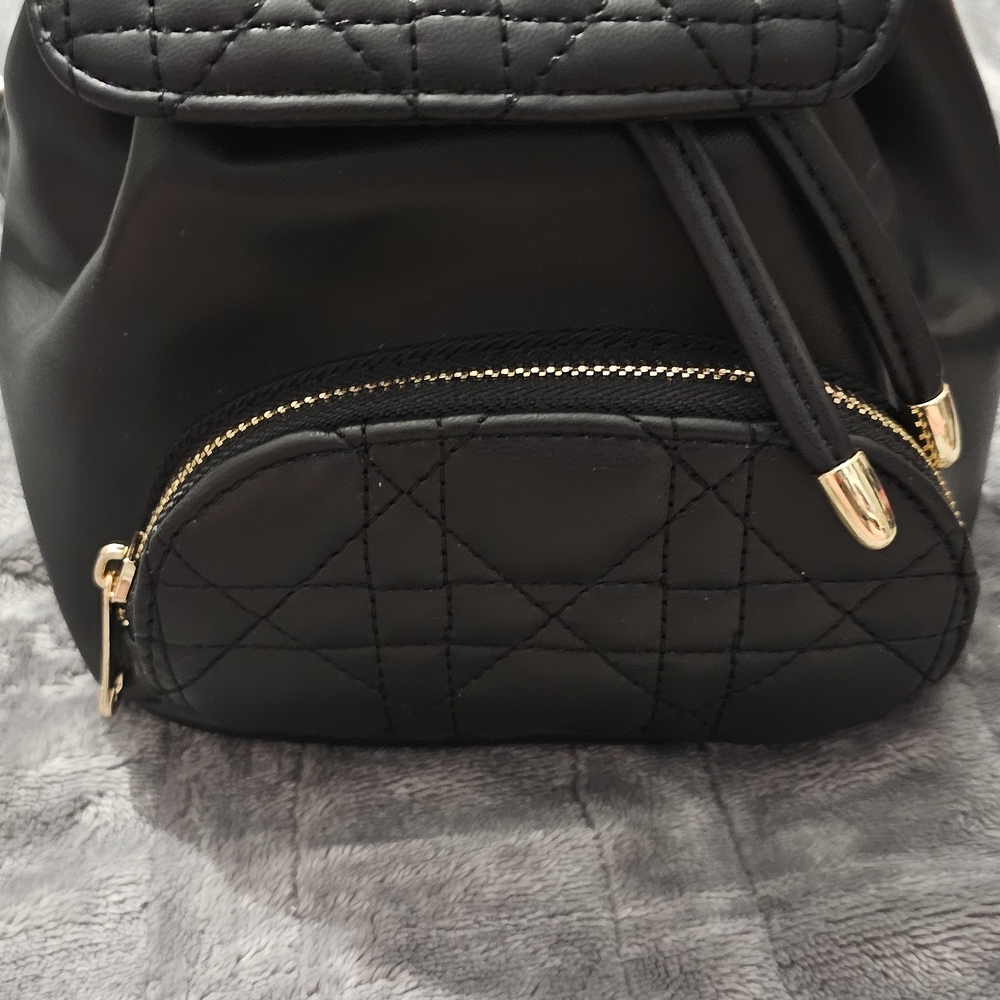 Icing Black Quilted Backpack with Gold Accents